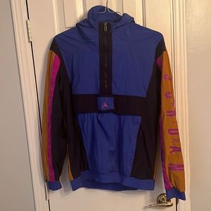 Blue, black, orange/brown, and pink Jordan pullover